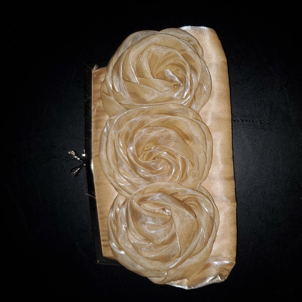 Elegant Gold Clutch with Floral Design